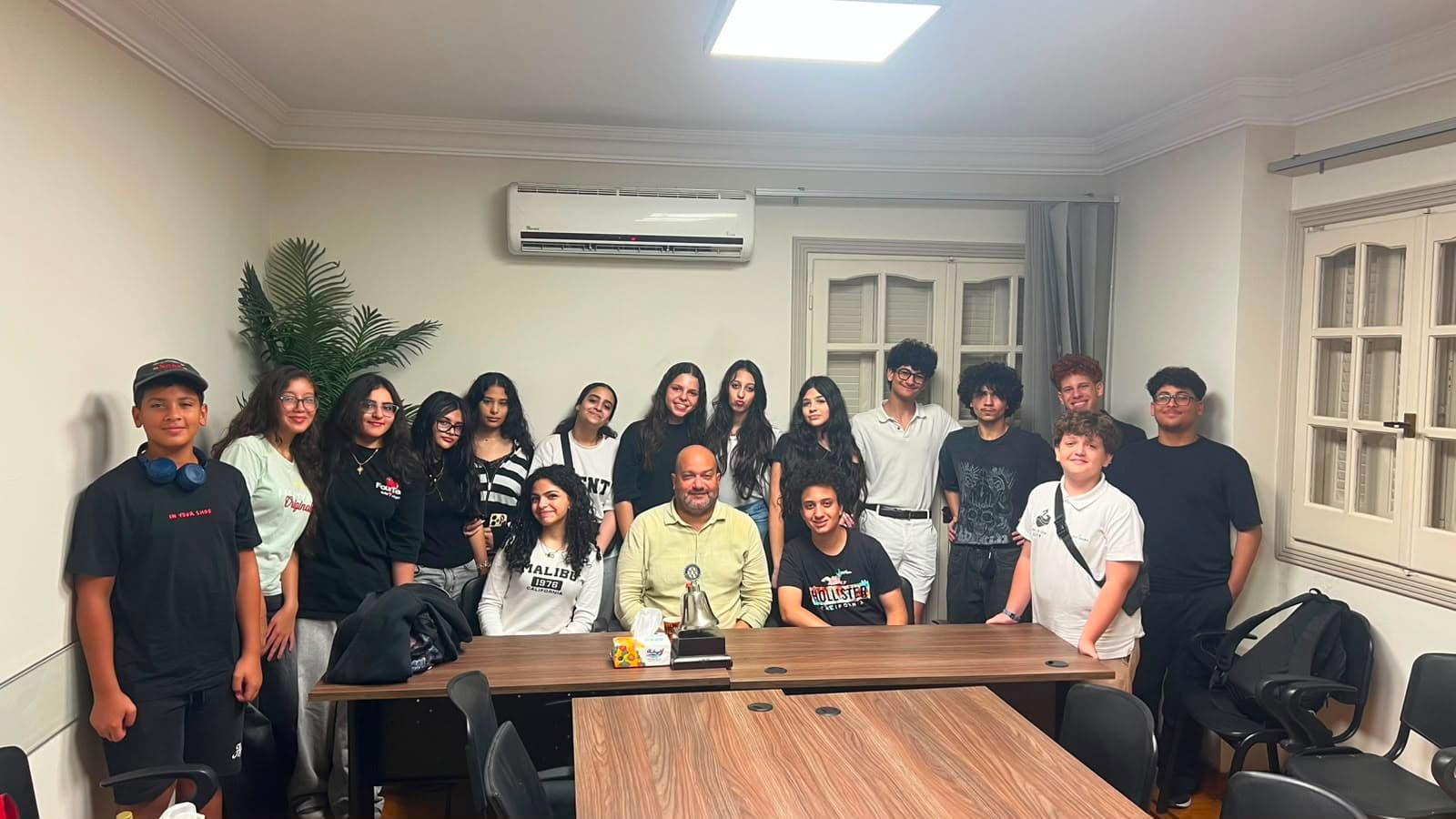 Interact Agora members gathered in the club meeting room